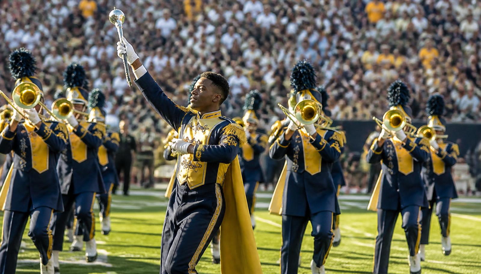 HBCU marching band performing at a homecoming football classic
